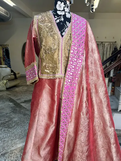 Our most demanded tissue silk suit. The combination of pink and gold is a classic for a reason.