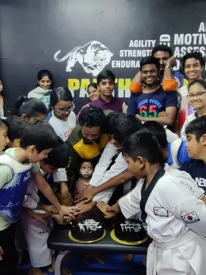 The next generation of champs cutting the cake for our club's anniversary. The energy and enthusiasm of our students is what drives us forward.