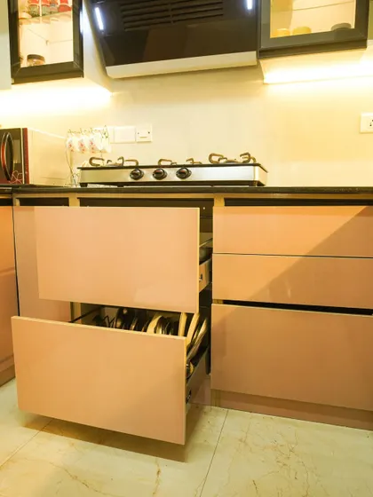 Another view of the deep drawer system, demonstrating its capacity and smooth operation. These drawers are a practical alternative to standard cabinets for storing heavy cookware and dinnerware.