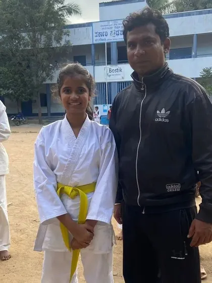 With one of my students at the district-level championships. These events are a great opportunity for students to represent their schools and our dojo.