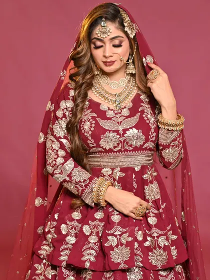 A beautiful pose showing the details of the makeup and the heavy jewelry. My students learn how to balance bold makeup with elaborate outfits.