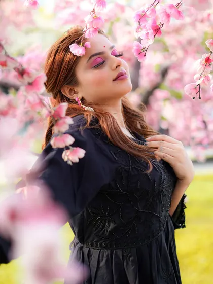 A serene, eyes-closed pose that adds an artistic touch to a beauty or fashion series.