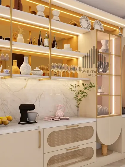 A closer look at a bespoke crockery unit, featuring a mix of open-lit shelves, glass-front cabinets, and drawers with cane webbing. The design combines gold accents and a marble backsplash for a touch of opulence.