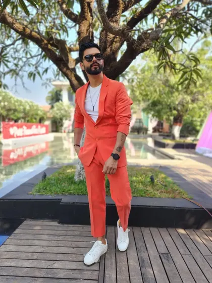 A bright and bold orange suit. This is a power look that's perfect for making a strong first impression.
