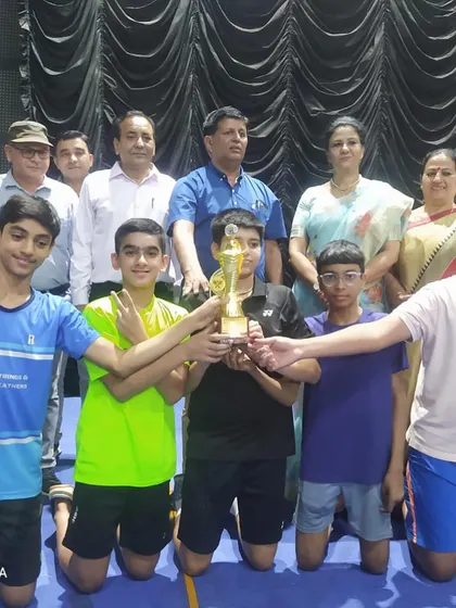 The team and officials celebrating the victory at the Haryana School State Championship.