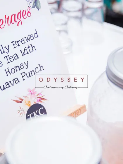 A close-up of our beverage station menu, featuring freshly brewed iced tea with honey and a guava punch. We create refreshing and unique non-alcoholic drink options for all events.