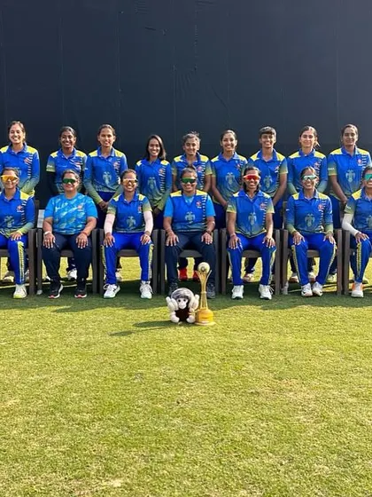 The victorious Karnataka U-19 women's team, featuring several of our academy's players, poses with their championship trophy.