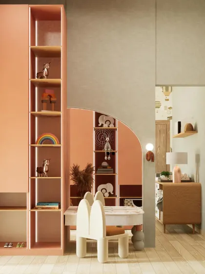 This view shows the transition from the play area with a kid-sized table and chairs into the main nursery space, highlighting the open and connected layout.