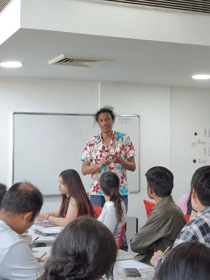 Author Johary Ravaloson leads a creative writing workshop for our students in the library. We provide unique opportunities for our students to learn directly from featured artists and authors.