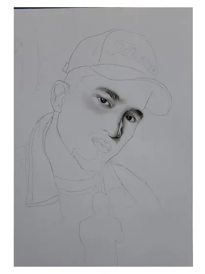 Progress shots of my Vivian 'Divine' Fernandes portrait, showing the layering of charcoal to create the mood and likeness.
