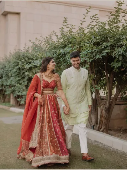 A candid walking shot filled with laughter. We believe in capturing the natural, happy moments that truly represent a couple's relationship.