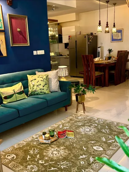 Another angle showing the connection between the living and dining areas. An open layout allows for a seamless flow, which I love to enhance with cohesive decor.