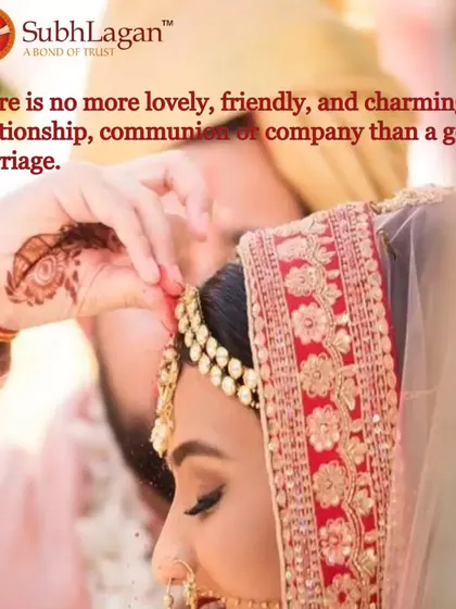 Another perspective of the sindoor daan, capturing the groom's gentle gesture and the bride's serene expression. It's a testament to the beautiful traditions we uphold in our matrimonial services.