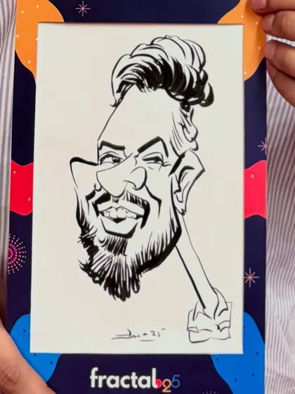 A close-up of a black and white caricature created during the Fractal25 corporate celebration. The custom branded frame makes it a perfect corporate souvenir.