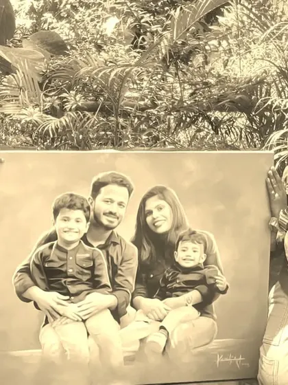 This family portrait was done in a classic, monochromatic style using acrylics, creating a timeless piece of art for the client.