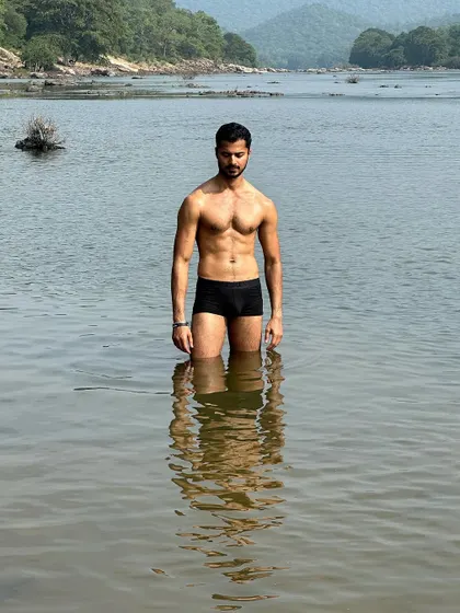 A repeat of a powerful stance, emphasizing the symmetry and definition of my physique.