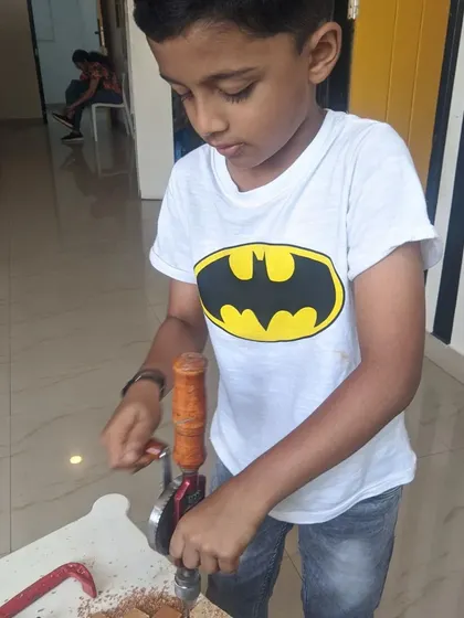 The Batman fan is also a budding engineer, learning how to use tools safely and effectively in our workshop.