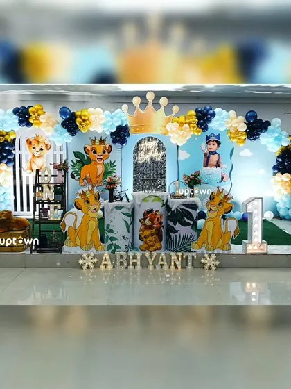 A royal prince Simba theme, combining the beloved Lion King character with a crown and a blue and gold color scheme.