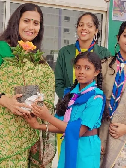 Our Cubs and Bulbuls unit presents a sapling to our principal during a school assembly, showcasing their commitment to environmental conservation.
