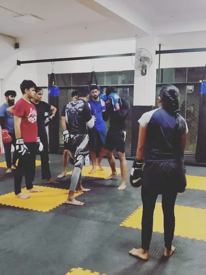 A moment during class where I am explaining a technique. The pain you feel today is the strength you feel tomorrow. We always encourage everyone to train hard and stay motivated.