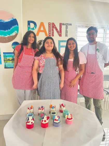Participants in our studio showing off the six different types of aroma and scented candles they learned to make in a single comprehensive workshop.