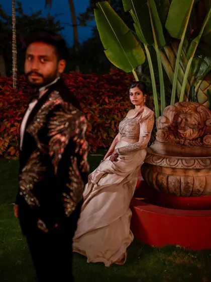 A power couple slaying their reception look. We love capturing the confidence and style of our couples, creating portraits that are both fashionable and full of personality.