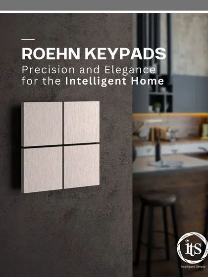 The four-button Roehn QUANTICA keypad, shown here against a modern kitchen backdrop. Its design complements contemporary spaces while providing powerful, intuitive control over lighting, audio, and other smart home scenes.