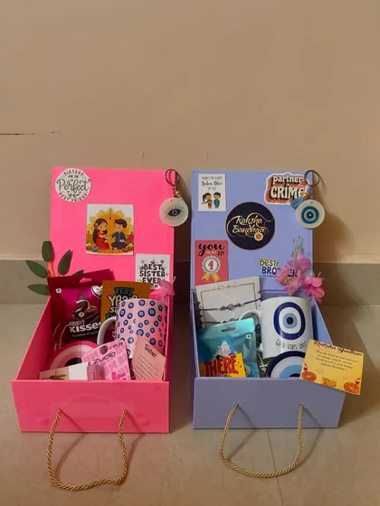 Fun and vibrant Raksha Bandhan hampers for brothers and sisters. I designed these with a trendy evil eye theme to celebrate the special bond between siblings with style and good vibes.