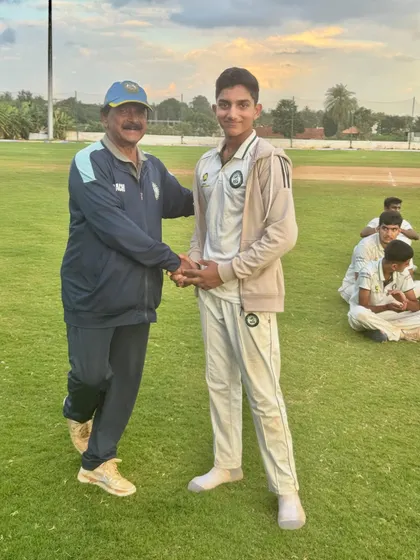 A coach congratulates a player from our U-19 squad, recognizing his hard work and performance.