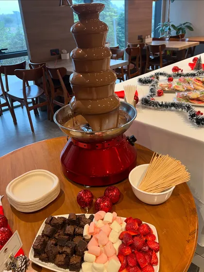A chocolate fountain was the star of this Christmas high tea. I served it with brownie bites, marshmallows, and fresh strawberries for dipping.
