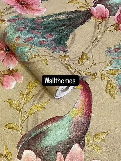 A close-up of a beige wallpaper roll with a colorful peacock and pink flower design.