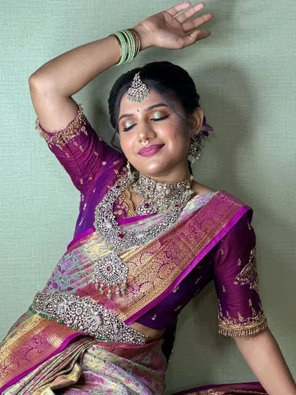 A playful and happy shot of the model, showing the complete look in all its glory.