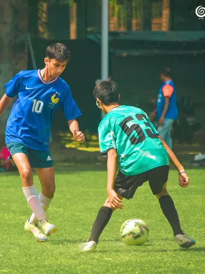 A player in a blue France jersey shows off their skills.