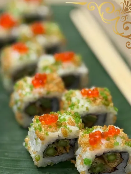 My culinary creativity extends beyond traditional grazing fare. These fresh sushi rolls, topped with colorful roe and tempura crunch, are a perfect example of how I can customize menus with gourmet international options.