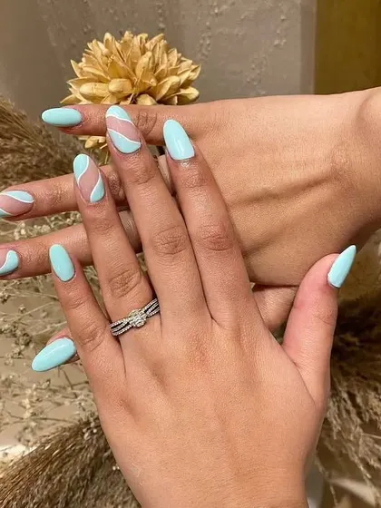 Flaunt your nails. This is the same minty blue abstract design, showing how great it looks from every angle.