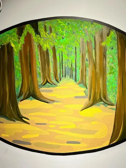 A forest path is captured in this oval painting, suggesting the experience of trail riding. The use of light and shadow creates a sense of depth and immersion.