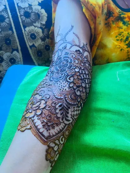 A close-up of the bridal henna, showing the intricate details and the beautiful 3D effect of the fresh paste.