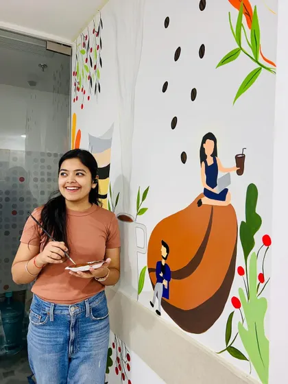 A happy moment during the painting process. The positive energy of this mural was contagious even while I was creating it.