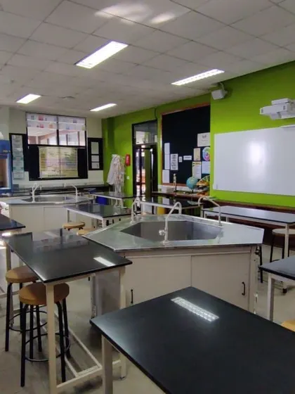Another view of the labs before renovation, showing how incremental, unplanned additions created a cluttered and inefficient teaching environment.