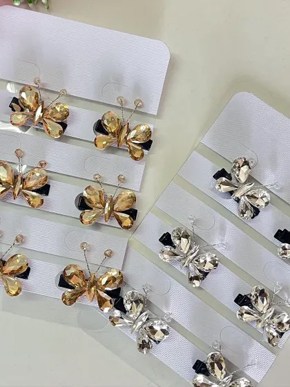 Whether you prefer silver or gold, these stone butterfly clips are a beautiful way to accessorize your hair for any occasion.