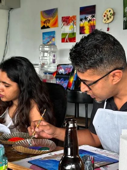 Another shot of guests enjoying the puzzle painting workshop. It's a great activity to do solo or with friends.