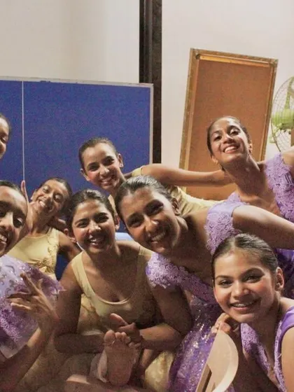 The energy and excitement backstage are contagious. Our dancers share moments of fun and support before they go on stage to perform.