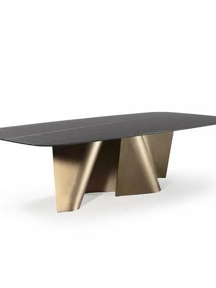 This concept piece showcases a dining table with a flowing, bent PVD rustic gold base. The design adds an element of elegance and movement to a space, and the finish can be customized in any PVD color.