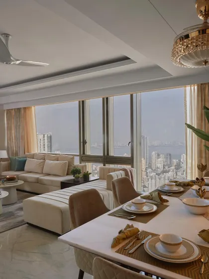 A beautiful view from a Lodha Complex home I designed, showing the open living and dining area with the Mumbai skyline as a backdrop. This project highlights my ability to deliver luxury interiors on time and within budget.