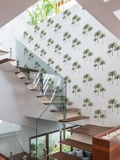 This staircase wall is brought to life with our Island Palm Tree stickers. The pattern adds a playful and tropical touch, making the journey upstairs a little more fun.