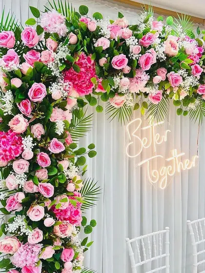 Our "Better Together" neon sign is a popular rental item for engagements, weddings, and anniversaries. It looks fantastic as a photo backdrop, especially when paired with a lush floral arch.