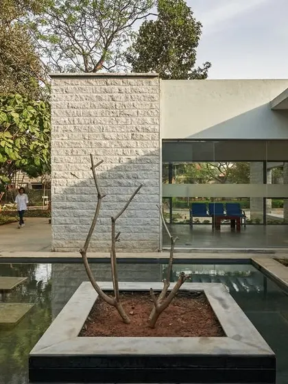 Another view of the tranquil water court, which serves as a central organizing element for the campus extension.