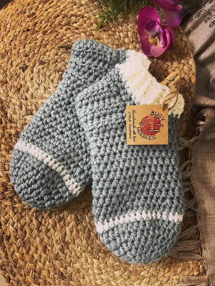 Look at these super cozy crochet socks! They are perfect for keeping your feet warm on cold nights. I can make them in any size and color.