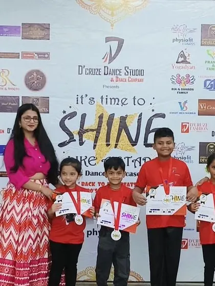 A small group of our youngest winners with their instructor and certificates.