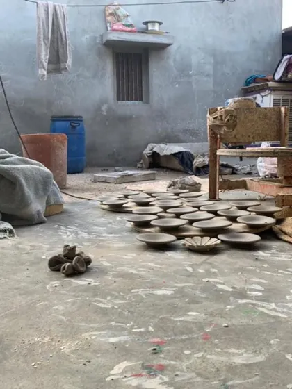 The artisan's courtyard in Kutch, where the handmade tiles for Brassa were laid out to dry. Choosing to work with local communities is a conscious decision to make our work more meaningful and memorable.